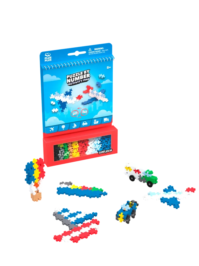 Blue Plus-Plus Activity Pad with red storage and built colorful interlocking toy cars, boats, and planes.