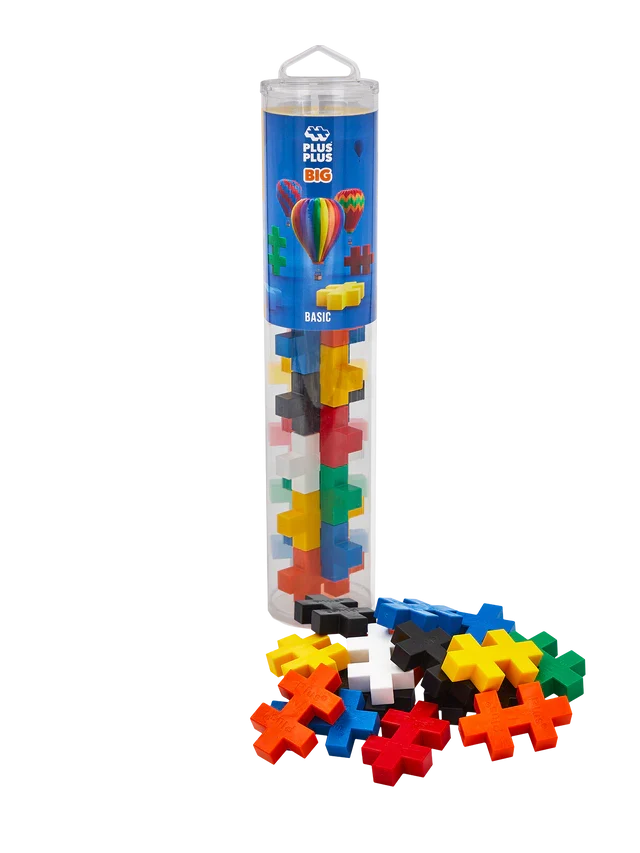Large plus-shaped building blocks in bright colors, shown inside a clear tube and scattered in a pile.