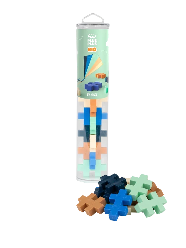 Plus-shaped building blocks in blue, mint, and orange, shown inside a clear tube and scattered at the base.