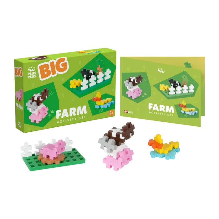 Green activity set box with colorful plus-shaped block figures of a pink pig, brown cow, and yellow duck.