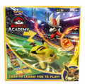 Yellow game box for Pokémon Battle Academy showing Pikachu, Cinderace, and Eevee on a vibrant stadium background.