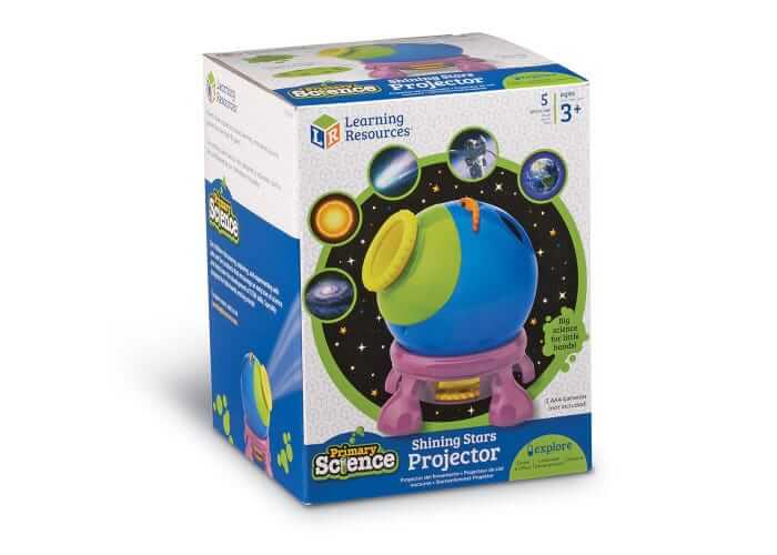 Blue and green spherical toy projector on a purple base in a box with illustrations of planets and stars.