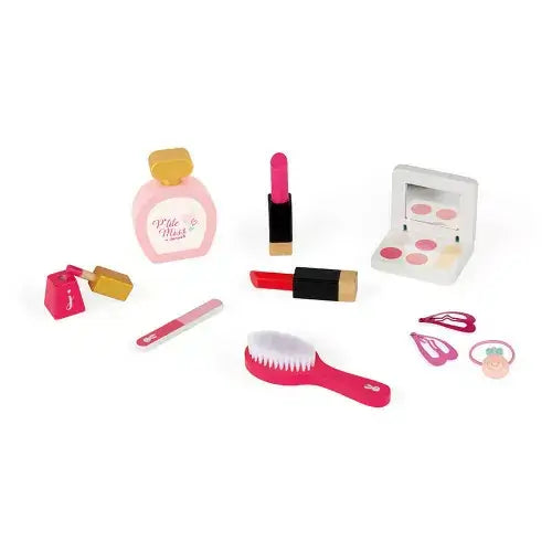 Pink and gold wooden toy beauty accessories including a perfume bottle, lipsticks, hairbrush, and makeup palette.