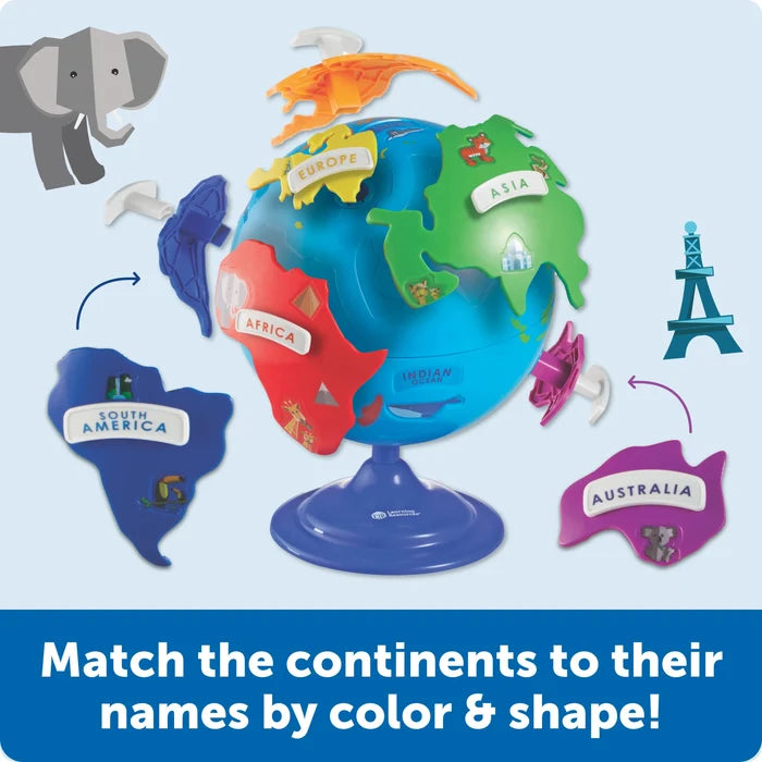 Blue toy globe with colorful, labeled continent puzzle pieces and animal icons to match by color and shape.