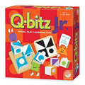 Red checkered game box for Q-Bitz Jr. featuring colorful patterned cubes and cheerful cartoon shape characters.