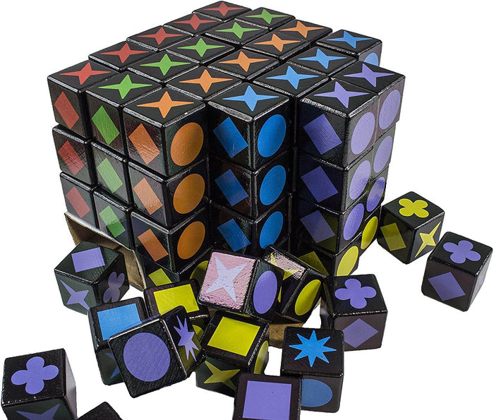 Black wooden cubes featuring colorful shapes like stars, circles, and diamonds stacked and scattered.