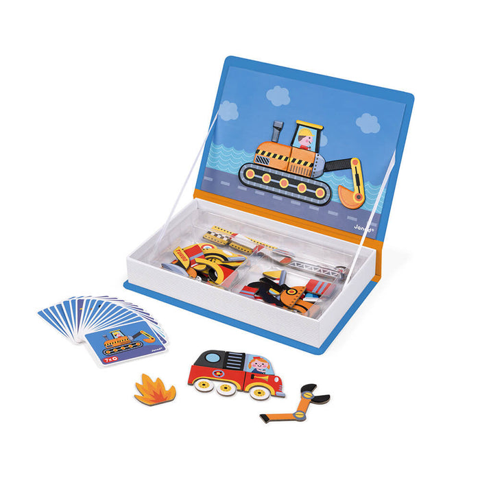 Open blue book-shaped magnetic toy with colorful vehicle magnets, reference cards, and a fire truck on a white surface.