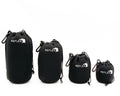 Reflex padded lens pouches in a row from largest to smallest against white background.