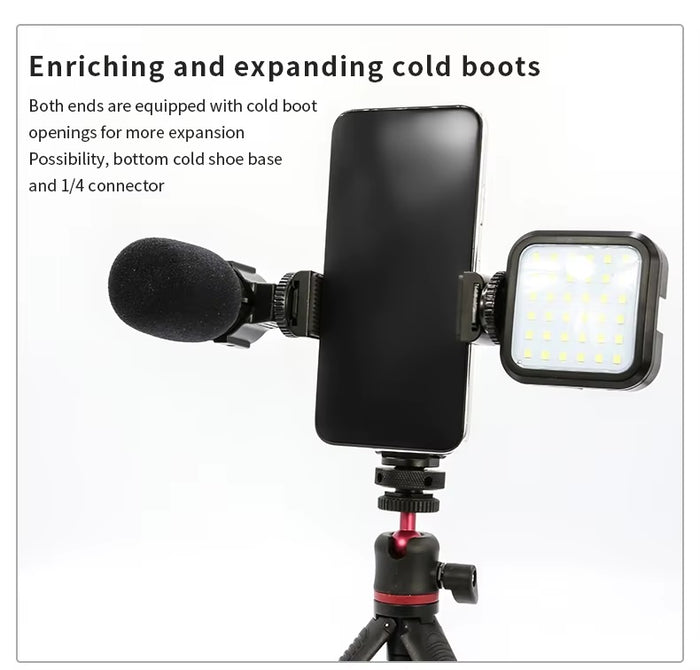 Phone mounted with LED light and microphone using dual cold shoes and a tripod base.