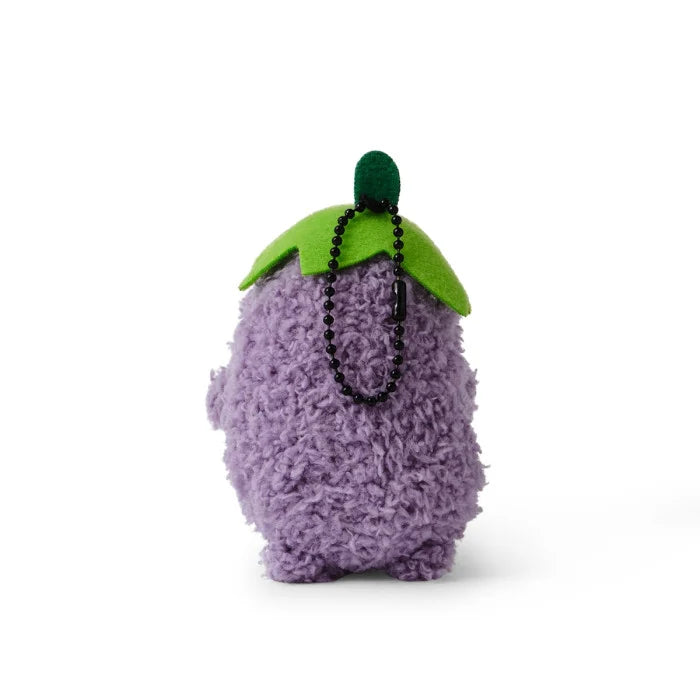 Small purple fluffy eggplant plush with green felt leaves and a black bead chain, shown from the back.