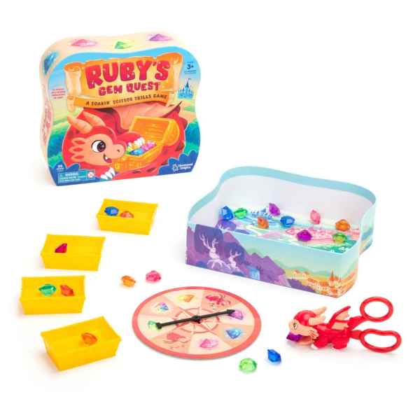 Red dragon scissor tool, colorful gems, yellow trays, and a spinner displayed with an illustrated dragon game box.