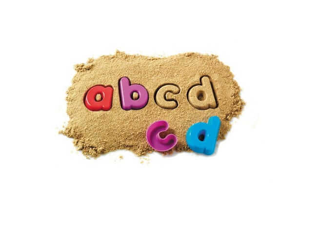 Red, purple, pink, and blue lowercase letter moulds and their impressions in a pile of tan play sand.