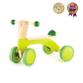 Four-wheeled wooden toddler ride-on toy with a lime green frame, natural wood seat, and dark green handles.