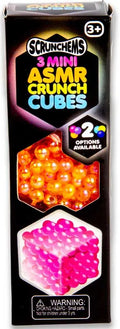 Black vertical box with colorful text, showing windows of orange jelly-like beads and a pink sphere-textured cube.