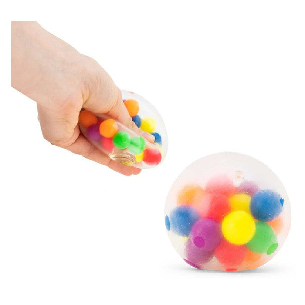 Hand squeezing a clear squishy ball filled with colorful beads, next to an identical round ball.