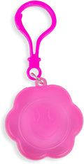 Neon pink flower-shaped squishy charm with a smiley face and a matching neon pink plastic keychain clip.