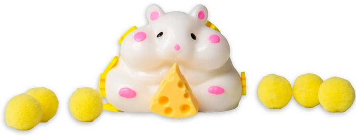 White squishy hamster toy with pink details holding cheese, surrounded by six yellow fuzzy balls.