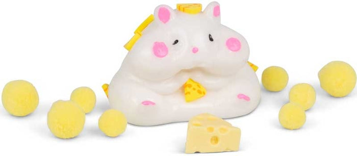 White squishy hamster toy with pink details holding cheese, surrounded by yellow sticky balls and a cheese wedge.