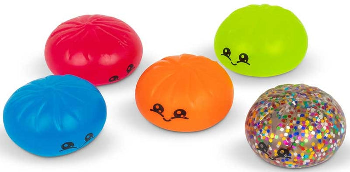 Five colorful squishy dumplings in red, green, blue, orange, and clear with confetti, each featuring a cute face.