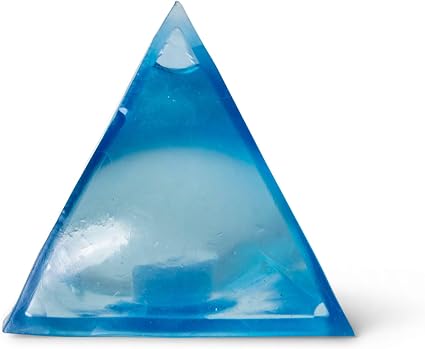 Translucent blue pyramid squishy toy with a pale center and small visible air bubbles.