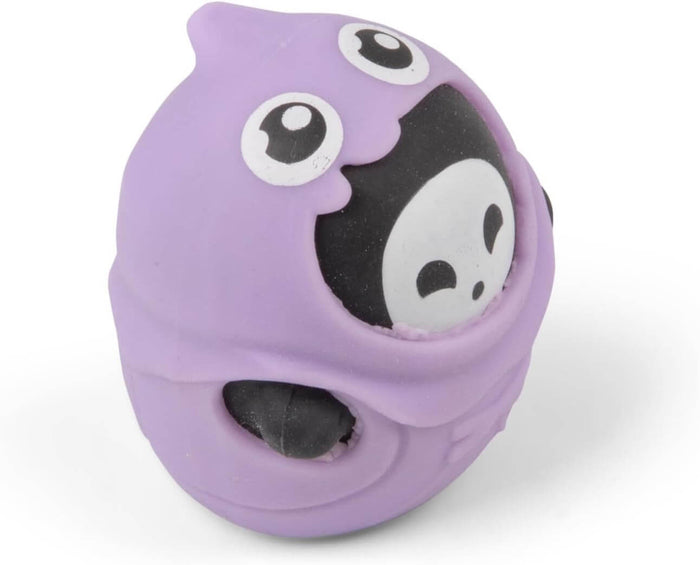 Round purple ghost squishy toy being squeezed to reveal a black inner layer with a small white ghost face inside.