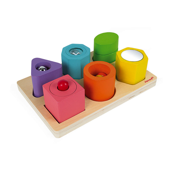 Six colorful wooden sensory blocks in varied shapes with mirrors and beads on a natural wood puzzle board.