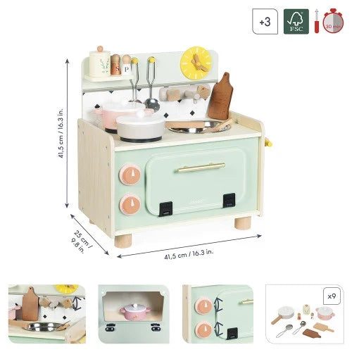 Mint green wooden toy kitchenette with oven, stove, clock, and 9 accessories. Features dimensions and product details.