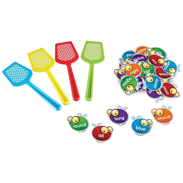 Four colorful fly swatters and cartoon fly-shaped cards with sight words like round, long, and blue.