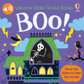 Purple book cover with a haunted house, a skeleton in the window, bats, and a pumpkin under the large white word BOO!