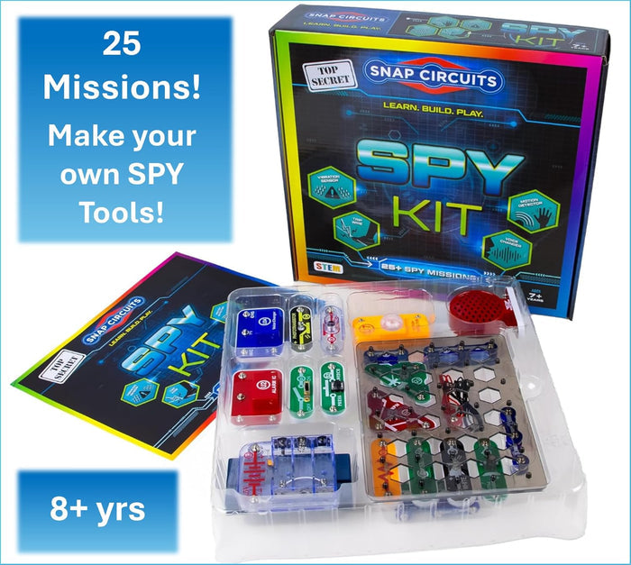 Black and neon spy kit box and manual next to a tray of colorful red, green, and blue electronic circuit parts.