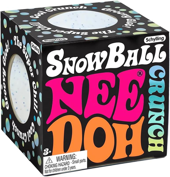 Black cube box with pink and orange text. Circular windows reveal a white, blue-speckled stress ball.