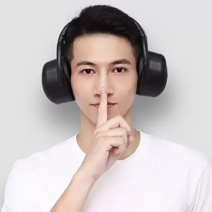 Person wearing Soundproof Earmuffs Professional Protection, highlighting noise-canceling features.