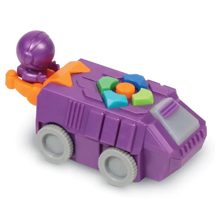 Purple toy space rover with colorful directional buttons on top, grey wheels, and a small purple astronaut figure.