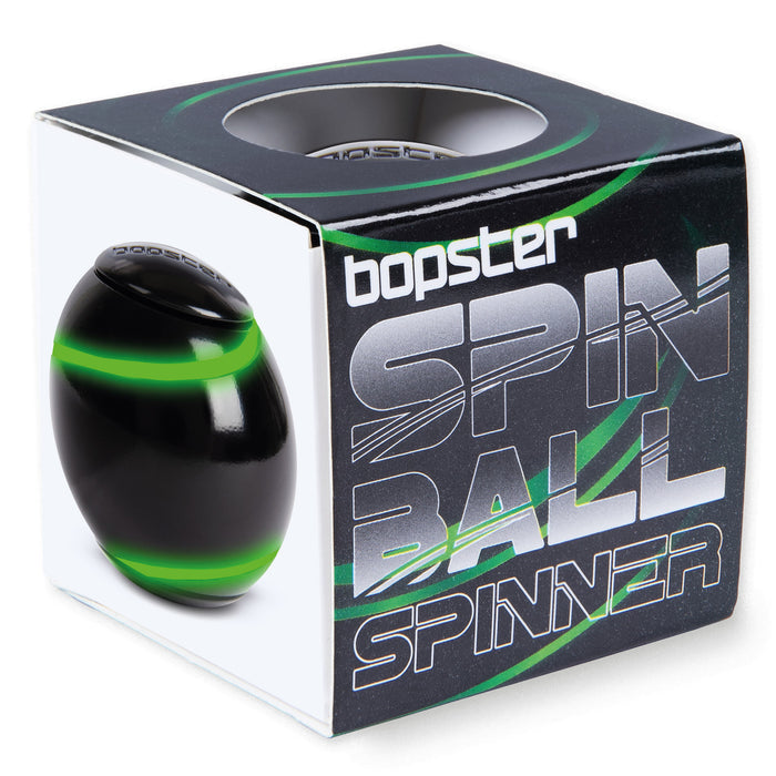 Black egg-shaped fidget toy with neon green stripes next to its black and green square retail box.