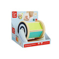 Hape wooden spinning drum toy with a mirror and colorful panels in blue and white retail packaging.