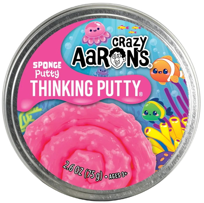 Round metal tin of textured pink Sponge Putty with a colorful underwater label showing cartoon fish and coral.