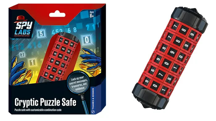 Red and black cylindrical safe with rotating number dials, shown beside its illustrated blue and red retail box.