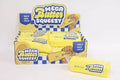 A yellow rectangular squishy toy shaped like a stick of butter in clear plastic wrapping next to its display box.
