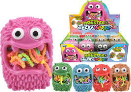 Textured pink monster toy with mouth full of neon worms, shown with smaller green, blue, red, and brown versions.