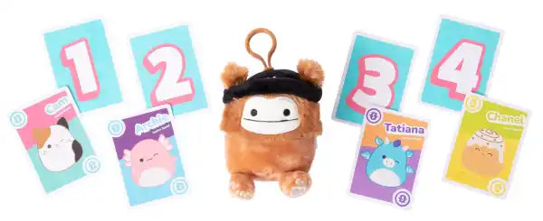 Orange Bigfoot plush clip surrounded by four numbered blue cards and four colorful Squishmallow character cards.