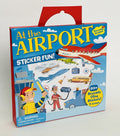 Red-handled blue box with cartoon illustrations of airplanes, a helicopter, and workers in yellow safety vests.