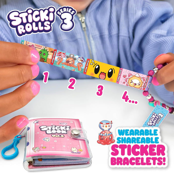 A beaded bracelet with a strip of character stickers and a small pink sticker book with a blue clip.