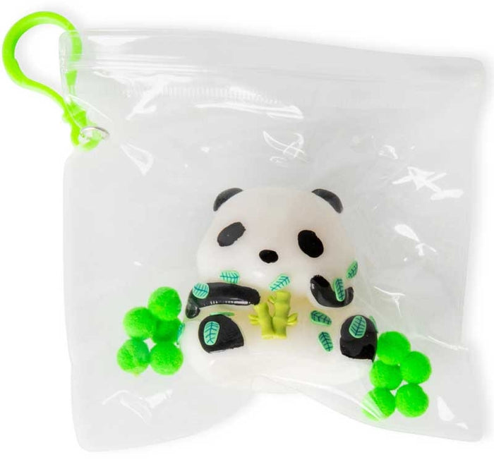 White and black panda squishy holding green bamboo in a clear zippered pouch with green pom-poms and a neon green clip.