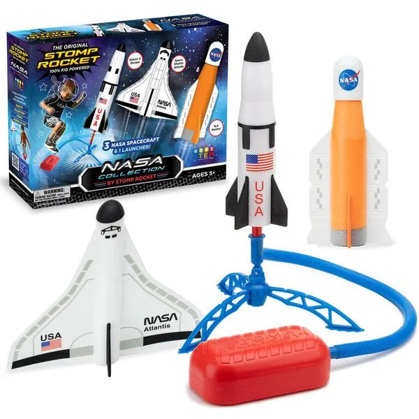 NASA toy set with three foam spacecraft in white and orange, a blue tripod launcher, and a red air stomp pad.