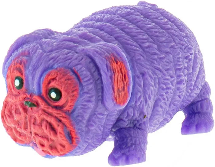 Wrinkled purple rubber dog toy with red face markings and black eyes on a plain white background.