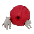 Two white kitten toys with a red textured yarn ball; one sits beside it and one peeks out from a hole.