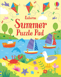 Bright activity book cover featuring a summer beach scene with kites, sailboats, dolphins, a red crab, and a seagull.