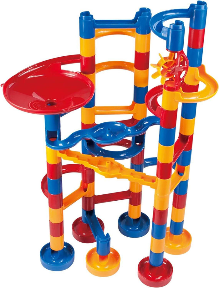 Colorful red, blue, and yellow marble run tower with various tracks, funnels, and spinning wheels.