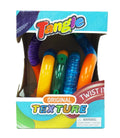 A colorful Tangle toy with various textured segments inside a blue and green cardboard box.