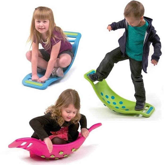 Three children playing on curved blue, green, and pink balance boards featuring suction cups on the bottom.
